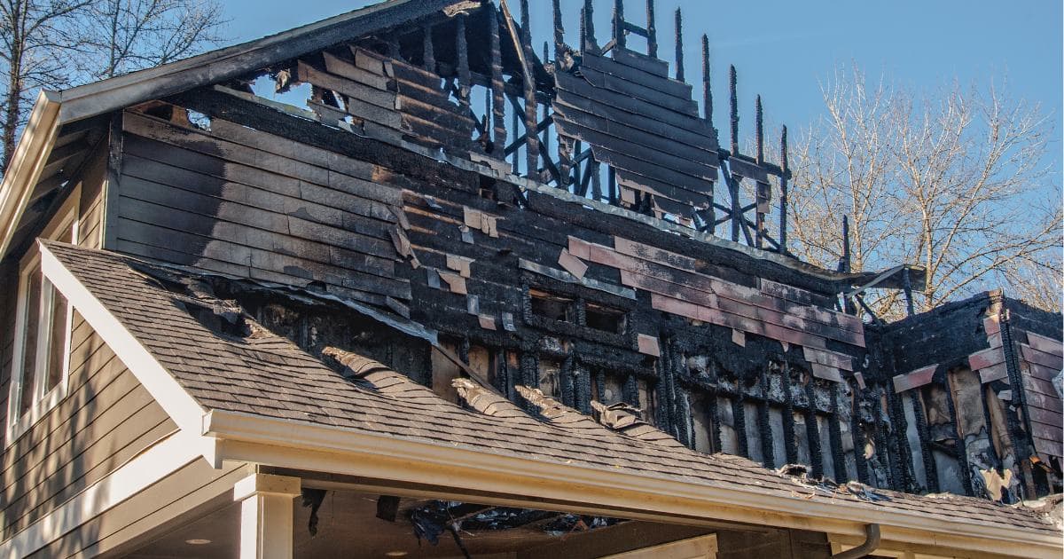 Fire-damaged interior during the early stages of restoration